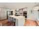 Modern kitchen with a large center island, stainless steel appliances, and an abundance of counter space at 3812 Chattawood Dr, Duluth, GA 30096