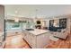 Bright, open kitchen with center island, stainless appliances, and seamless flow into the living area at 3812 Chattawood Dr, Duluth, GA 30096