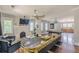 Spacious living room with hardwood floors, fireplace, and ample natural light, ideal for Gathering gatherings at 975 Dill Sw Ave, Atlanta, GA 30310