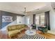 Stylish living room featuring modern furniture, hardwood floors, and ample natural light at 975 Dill Sw Ave, Atlanta, GA 30310