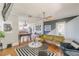 Spacious open-concept living area with hardwood floors and a neutral color palette, perfect for entertaining guests at 975 Dill Sw Ave, Atlanta, GA 30310