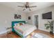 A main bedroom featuring stylish decor, hardwood floors, and ample natural light at 975 Dill Sw Ave, Atlanta, GA 30310