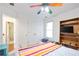 Comfortable bedroom features a spacious closet, neutral colors, and plenty of sunlight at 1441 Hada Ln, Lawrenceville, GA 30043