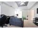 Bonus room with carpet, couches, and access to other rooms at 1441 Hada Ln, Lawrenceville, GA 30043