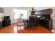 Spacious home office featuring hardwood floors and a large window offering plenty of natural light at 1441 Hada Ln, Lawrenceville, GA 30043