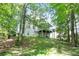 Two-story home featuring a screened in porch overlooking the private wooded backyard at 1441 Hada Ln, Lawrenceville, GA 30043