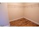 Walk in closet with wire shelving and wood flooring at 4135 Arch Pass, Cumming, GA 30040