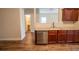 Partial kitchen view features granite counters and stainless steel dishwasher at 4135 Arch Pass, Cumming, GA 30040