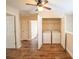 Upstairs laundry room with washer and dryer hookups with shelving in closet at 4135 Arch Pass, Cumming, GA 30040