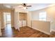 Upstairs laundry room with washer and dryer hookups with shelving in closet at 4135 Arch Pass, Cumming, GA 30040
