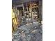 Extensive fire damage is visible, showing charred remains and a need for total reconstruction in bedroom at 447 Martindale Ct, Stone Mountain, GA 30088