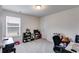 Bedroom with neutral carpet, good natural light, a closet, and neutral paint at 510 Abeer St, Temple, GA 30179