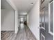 Welcoming foyer with light gray walls and wood-look floors extends through the home at 510 Abeer St, Temple, GA 30179