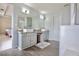 Spacious bathroom features double sinks, granite counters, and modern updates at 5996 Eagle Tiff Ln, Sugar Hill, GA 30518