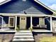 Charming front porch with a swing, cozy seating, and a welcoming ambiance at 776 Green Dr, Canton, GA 30114