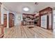 Spacious kitchen features wooden cabinetry, stainless steel appliances, and light hardwood floors at 776 Green Dr, Canton, GA 30114