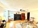 Bright living room featuring a fireplace, wooden floors, rocking chairs and charming decor at 776 Green Dr, Canton, GA 30114