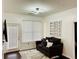 Cozy living area with a modern ceiling fan, comfortable sofa, and bright natural light through window at 870 Mayson Turner Rd # 1207, Atlanta, GA 30314