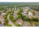 Aerial view of this property in a serene, tree-lined community with well-maintained homes at 300 Brackin Trce, Grayson, GA 30017