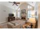 Bright living room with a stone fireplace, plantation shutters, and cozy seating arrangement at 300 Brackin Trce, Grayson, GA 30017