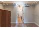 Spacious walk-in closet with built-in shelving and a view of the bathroom at 300 Brackin Trce, Grayson, GA 30017
