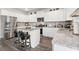 Well-equipped kitchen with stainless steel appliances, granite countertops, and a functional island at 3303 Hawthorn Farm Blvd, Loganville, GA 30052