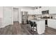 Bright kitchen features stainless steel appliances, a kitchen island, and an abundance of counter space at 3303 Hawthorn Farm Blvd, Loganville, GA 30052