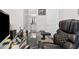 Office with a large chair and an open door looking into a bathroom at 3303 Hawthorn Farm Blvd, Loganville, GA 30052