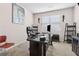 A well-lit office space with a large window and office furniture at 3303 Hawthorn Farm Blvd, Loganville, GA 30052