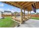 Spacious patio area with outdoor seating, perfect for entertaining at 3303 Hawthorn Farm Blvd, Loganville, GA 30052