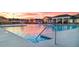 Community pool with fountains offers a refreshing recreational spot, complemented by a nearby lounge area and neighborhood views at 3303 Hawthorn Farm Blvd, Loganville, GA 30052