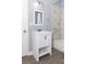 Bathroom featuring a vanity with a white sink and marble tiled shower at 996 Palmetto Sw Ave, Atlanta, GA 30314
