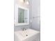 Bathroom featuring vanity with modern sink and mirror, accented by chrome fixtures at 996 Palmetto Sw Ave, Atlanta, GA 30314