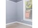 Bedroom with natural light from a window and light blue walls at 996 Palmetto Sw Ave, Atlanta, GA 30314