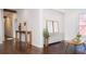 Open-concept with rich dark hardwood floors, neutral color scheme, and lots of natural light at 996 Palmetto Sw Ave, Atlanta, GA 30314