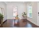 Modern Living Room features hardwood floors, crisp white walls, and lots of natural light at 996 Palmetto Sw Ave, Atlanta, GA 30314