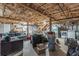 Unfinished basement area with exposed ceiling, block walls, and some furniture and appliances at 2089 Quilt Ct, Lithonia, GA 30058