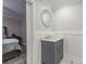 This elegant bathroom includes a modern vanity and mirror at 2089 Quilt Ct, Lithonia, GA 30058