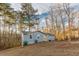 Exterior of home features a large yard at 2089 Quilt Ct, Lithonia, GA 30058