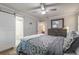 Comfortable main bedroom with sliding barn door to ensuite bathroom at 2089 Quilt Ct, Lithonia, GA 30058