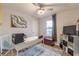 This home office offers natural light, a spacious desk, and ample storage at 2089 Quilt Ct, Lithonia, GA 30058