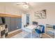 This home office has built-in storage, stylish decor, and a modern desk at 2089 Quilt Ct, Lithonia, GA 30058