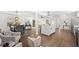 Open floor plan with dining area, kitchen, and living room with hardwood floors at 2277 Cloverdale Se Dr, Atlanta, GA 30316