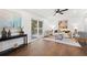 Cozy living room with hardwood floors, a ceiling fan and sliding glass doors at 2277 Cloverdale Se Dr, Atlanta, GA 30316