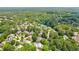 Aerial view of the community showcases homes surrounded by lush green trees at 2903 Ashebrooke Ne Dr, Marietta, GA 30068