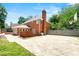 Expansive backyard with brickwork features a basketball hoop and extra parking space at 2903 Ashebrooke Ne Dr, Marietta, GA 30068