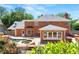 Backyard featuring in-ground pool, landscaped yard, and brick patio at 2903 Ashebrooke Ne Dr, Marietta, GA 30068