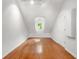 Bright bedroom with hardwood floors, slanted ceiling, and a window at 2903 Ashebrooke Ne Dr, Marietta, GA 30068