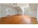 Spacious bedroom featuring hardwood floors, bright window, and ceiling fan at 2903 Ashebrooke Ne Dr, Marietta, GA 30068
