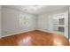 Bedroom with hardwood floors and natural light, access to en-suite bathroom at 2903 Ashebrooke Ne Dr, Marietta, GA 30068